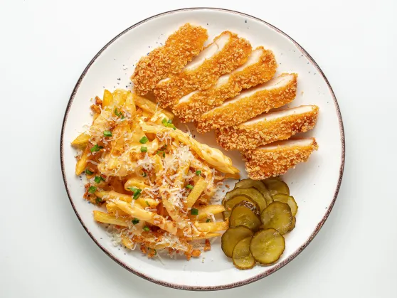 Chicken Schnitzel with French Fries and cheese sauce